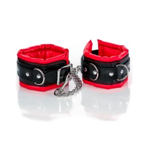 Leather bdsm sex handcuffs and butt plug. Erotic restraint accessory set, padded wrist cuffs and anal kinky toy. Sexy bondage fetish gift. Truhani.