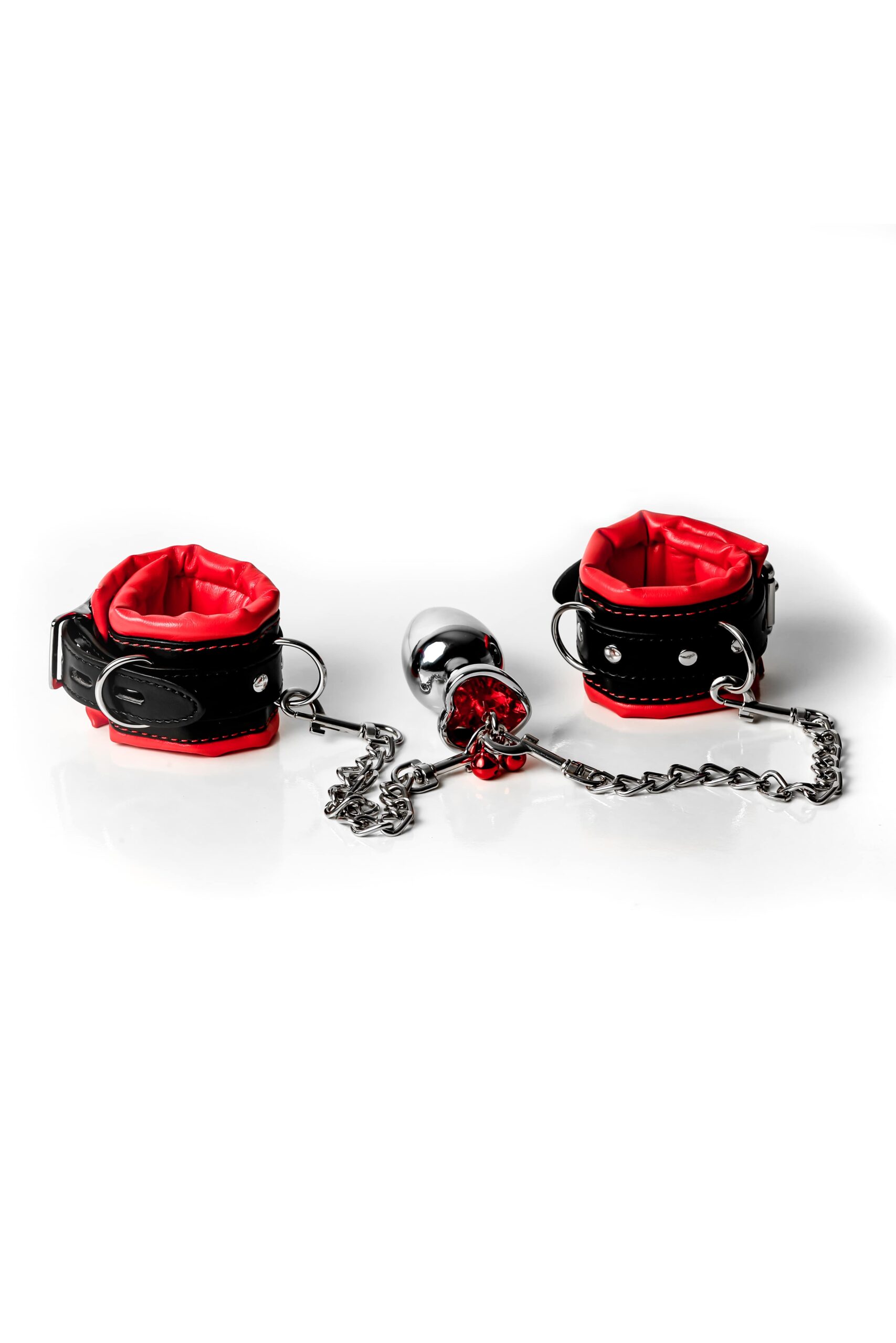 Leather bdsm sex handcuffs and butt plug. Erotic restraint accessory set, padded wrist cuffs and anal kinky toy. Sexy bondage fetish gift. Truhani