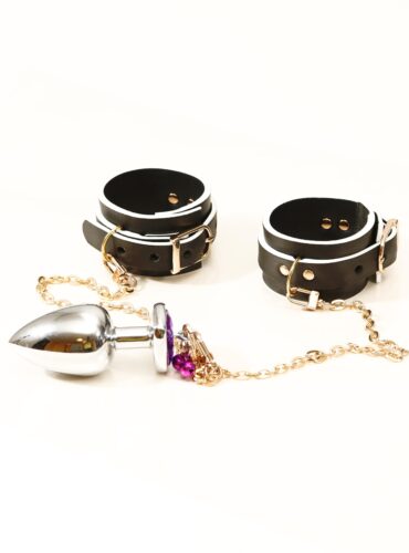 Sex handcuffs. Submissive set. Sexy fetish gift. Great for beginners and connoisseurs alike, this set has everything to make you immerse yourself in a BDSM fantasy. The wide end faces forward, the narrow end faces back. $76