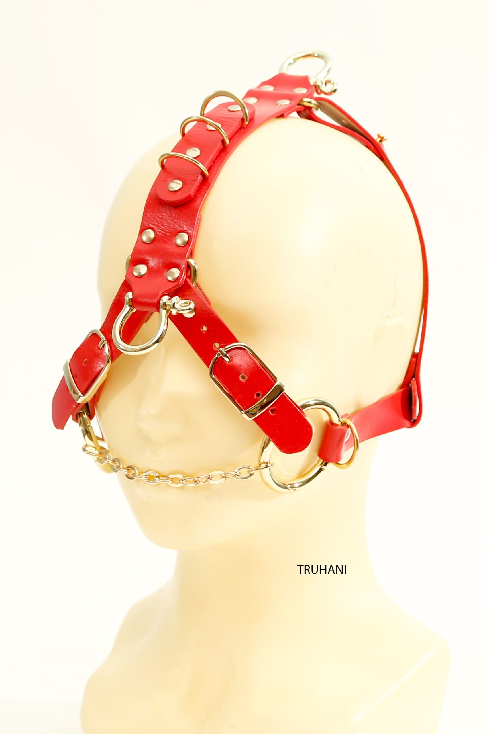 Red leather fetish submissive gag mouth dilator mask for BDSM sex fantasy with open oral fixation. Sexy restraint horse mask with snaffle bit. Bridle for pony play and Kinky party
