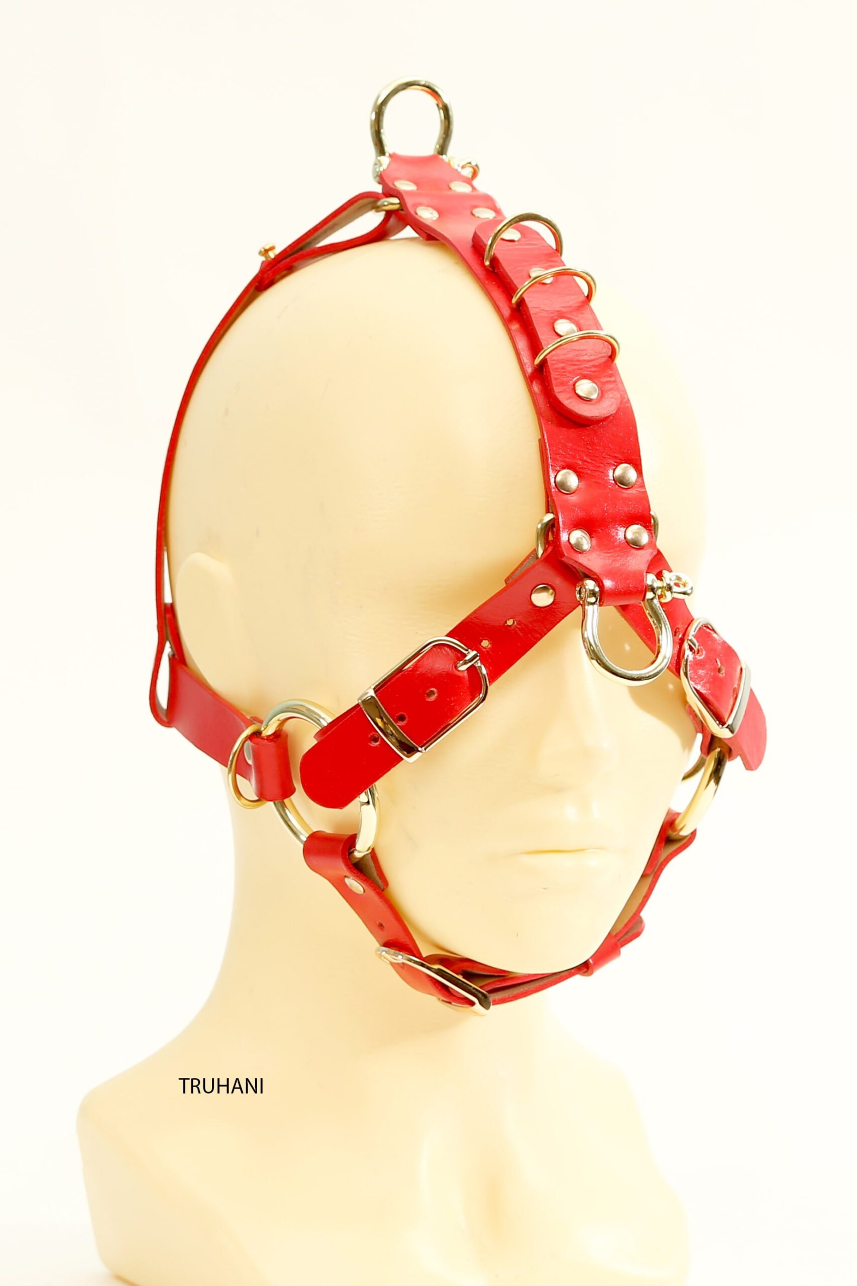 Red leather fetish submissive gag mouth dilator mask for BDSM sex fantasy with open oral fixation. Sexy restraint horse mask with snaffle bit. Bridle for pony play and Kinky party